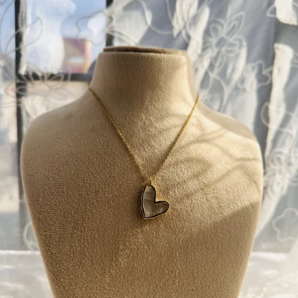 TITLED HEART NECKLACE