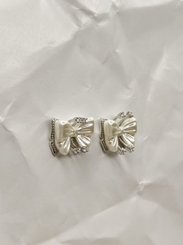 WhatsApp Image 2025-07-07 at 18.47.53_fd091e81 Pearl Bow Stud Earrings
