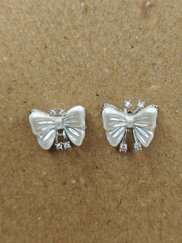 WhatsApp Image 2025-07-07 at 18.47.53_fe68a828 Pearl Bow Stud Earrings