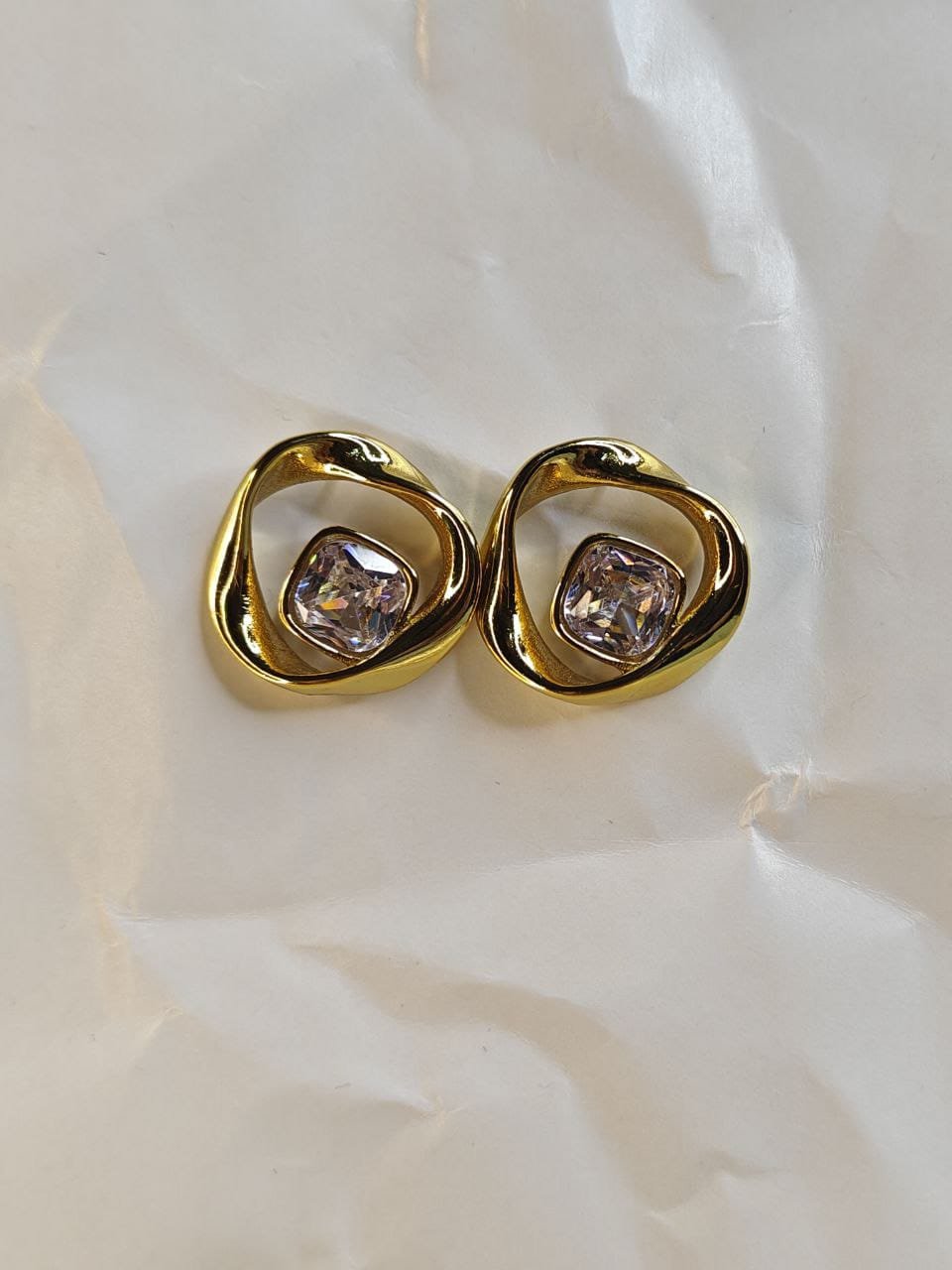 Gold Modern Swirl Earrings with Crystal Center