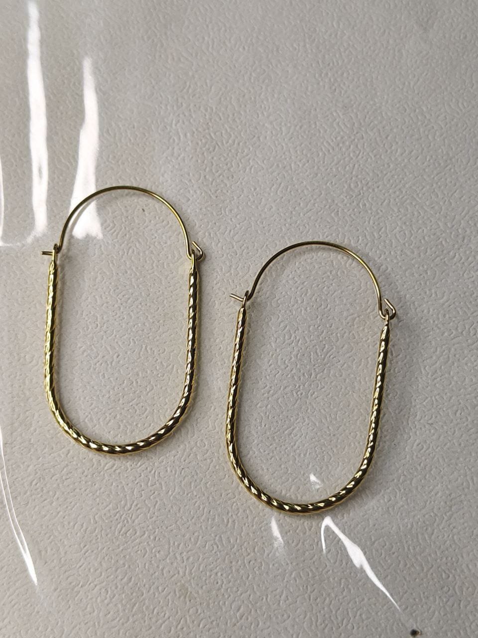 Ira Gold-Plated Twisted Oval Hoop Earrings