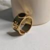 The Solstice Ring – Gold Band with Black Enamel & Cutout Detailing